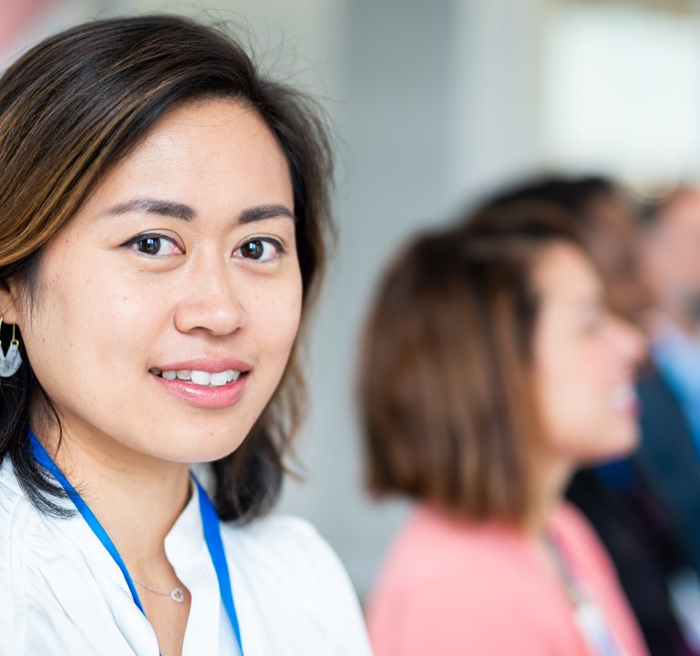 A woman smiling